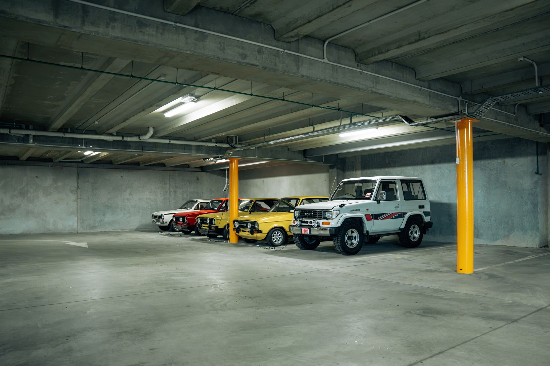 Vehicles parked in the secure underground storage at Glenda Drive