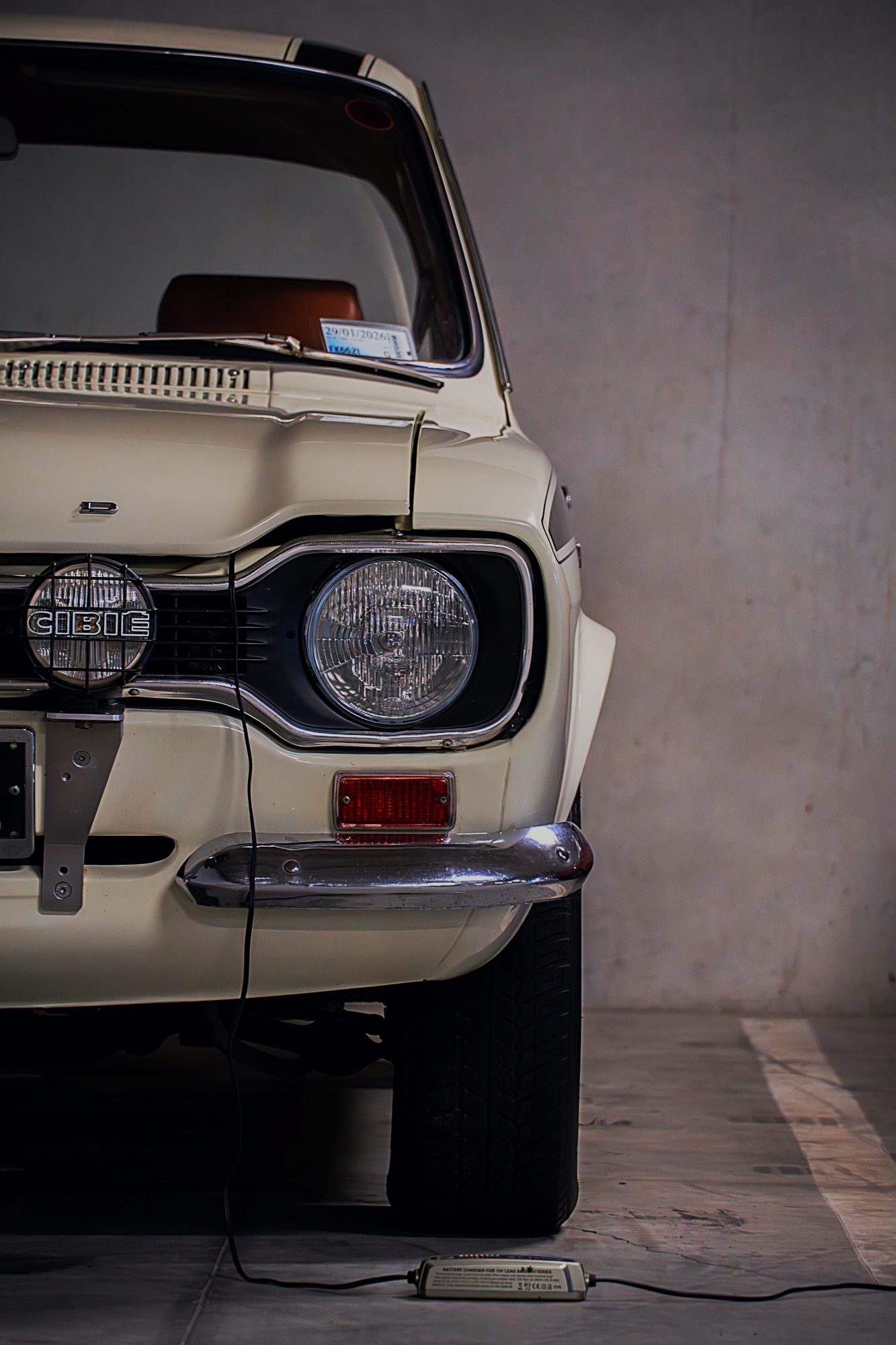 Restored white Ford Escort front detail